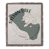 Sylvan Lake, South Dakota map with compass rose on woven blanket.