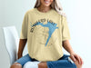Rushford Lake New York graphic on yellow t-shirt with compass.