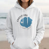 White hoodie with blue Crater Lake Oregon graphic and compass design.