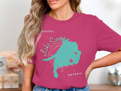 Pink t-shirt with turquoise Lake Simcoe map and compass design.