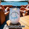 A white tumbler featuring a blue map of Lake Thunderbird rests on a wooden boat table.