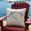 Pillow with "Skaneateles Lake" text and map on a red Adirondack chair.