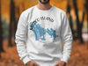 White sweatshirt with a blue map of Marco Island, Florida and compass graphic.