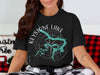 Black t-shirt with Keystone Lake Oklahoma map design and compass rose graphic.