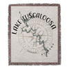 Woven blanket featuring Lake Tuscaloosa map and compass rose design with fringed edges.