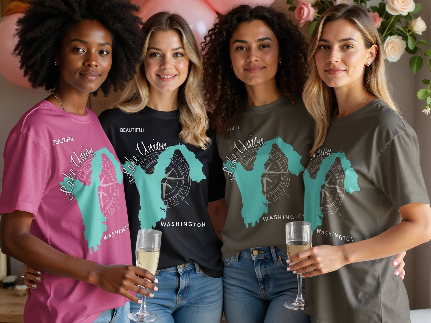 Four women in t-shirts featuring a map of Washington state and compass.