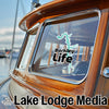 Barkley Life sticker on a boat window with Lake Lodge Media logo at bottom.