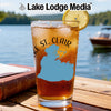 Glass with iced tea, lemon, and a map of Michigan in front of a lake.