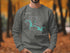 Dark gray sweatshirt with Lake Dardanelle Arkansas map and compass design.
