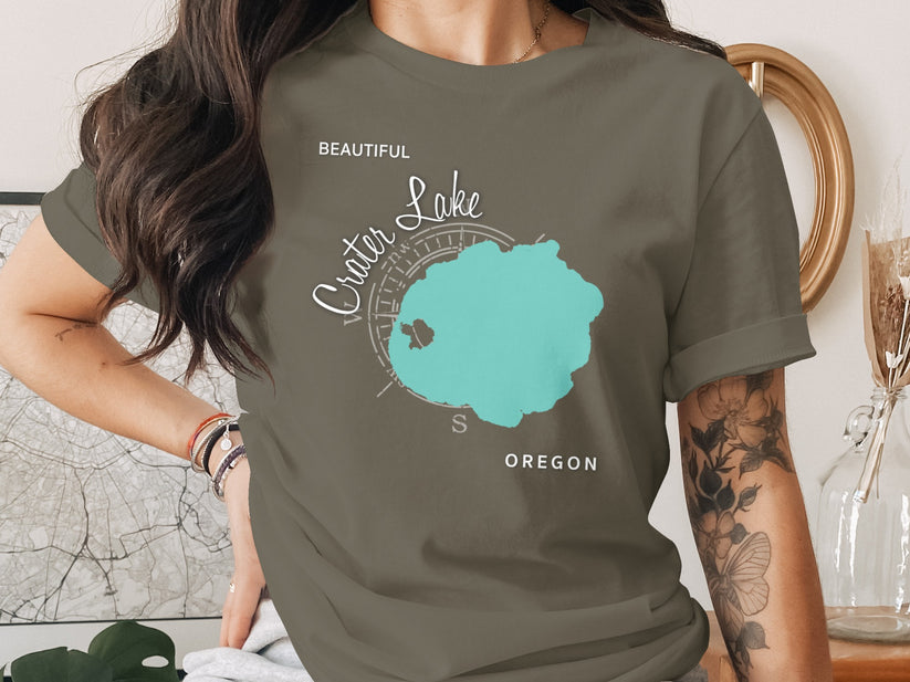 Crater Lake Oregon map graphic on a dark olive t-shirt.