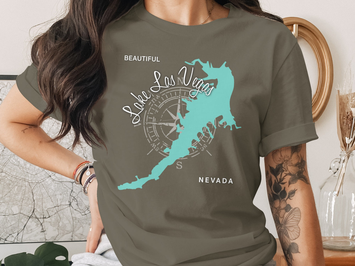 Green t-shirt with "Beautiful Lake Las Vegas Nevada" and compass graphic.