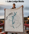 Throw blanket with Lay Lake Alabama map design and compass rose.