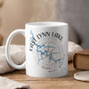 White mug with East Lynn Lake Virginia map design and compass rose.