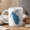 White mug with Black Lake, New York map and compass design.