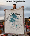 Man holding a blanket with Lake Blue Ridge, Georgia map and compass design.
