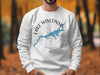 White crewneck sweatshirt with blue Lake Wisconsin map and compass design in black.