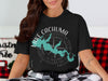Black t-shirt with "Lake Cachuma California" text, map, and compass design.