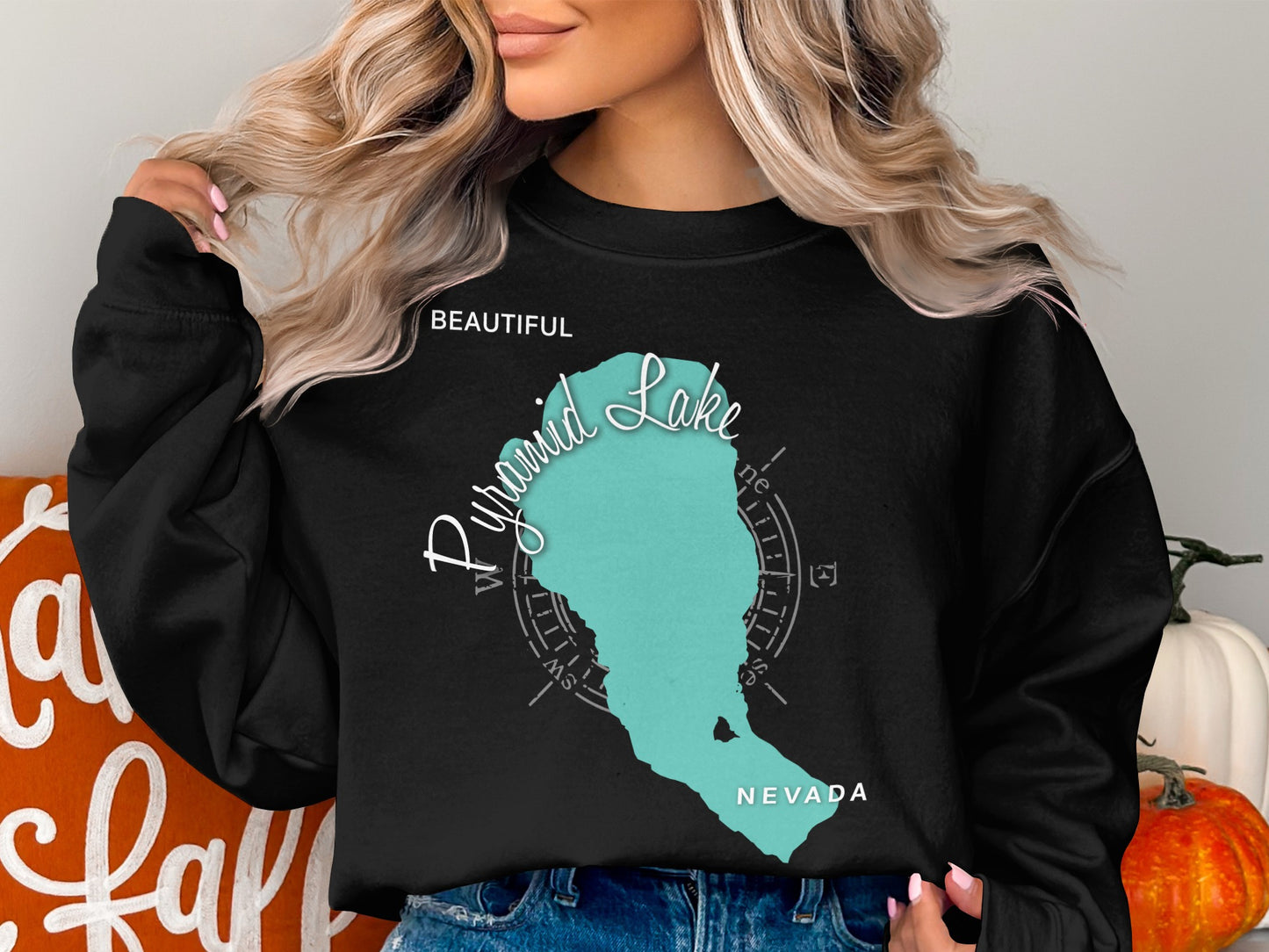Black sweatshirt with Pyramid Lake, Nevada map and compass graphic.