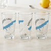 Three clear glasses with a blue outline of Sardis Lake and a compass design.