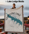 Grapevine Lake map and compass design on a fringed woven blanket.