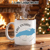 White mug with Lake Ontario map and compass design, steaming hot coffee.
