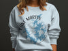 Light blue sweatshirt with Lake Martin Alabama map and compass graphic.