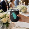 Black Lake New York graphic on a black tumbler held by a hand.