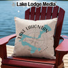 Decorative pillow with Lake Lahontan map and compass on a red Adirondack chair.