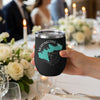 Black tumbler with Merrymeeting Lake New Hampshire design held at a formal event.