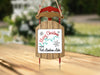 Wooden sleigh ornament with "Merry Christmas FROM Fort Loudoun Lake" text.