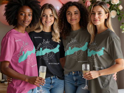 Four women wear t-shirts with a stylized compass and Geneva Lake, Wisconsin design.