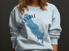 Light blue sweatshirt with Gull Lake, Michigan map and compass graphic.