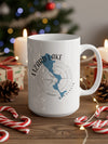 White mug with Lizard Lake Minnesota map and compass, surrounded by Christmas decor.