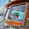 Turquoise Wawasee Life sticker on a boat window, "Lake Lodge Media" text below.