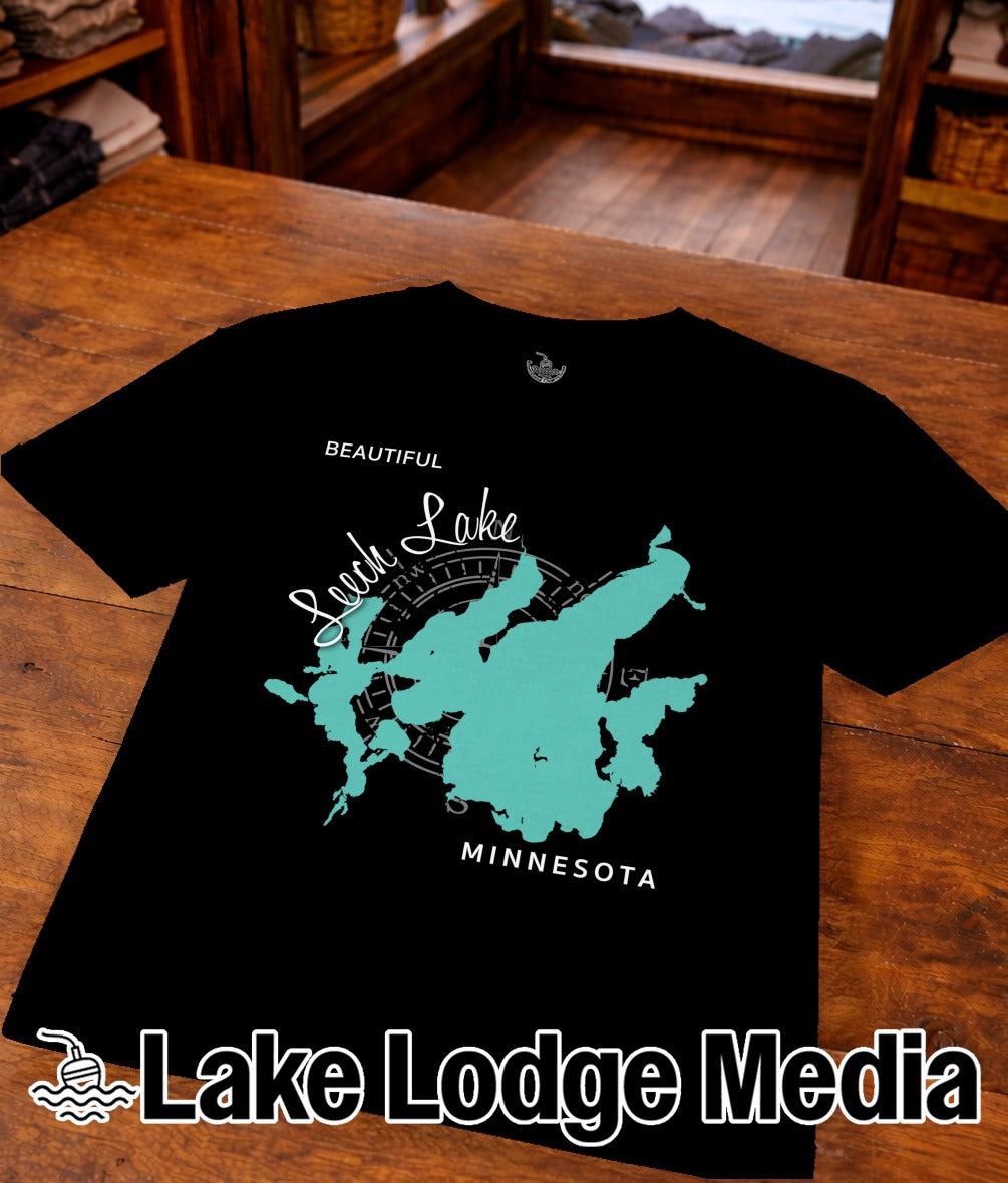 Black t-shirt with "Leach Lake Minnesota" map graphic and "Lake Lodge Media" logo.