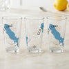 Three clear glasses with blue Gull Lake, Michigan maps and compass designs.