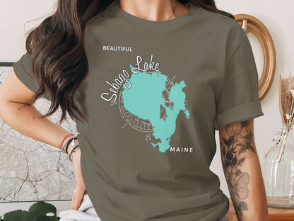 Sebago Lake Maine map with compass rose on a dark green t-shirt.