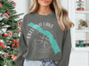 Sweatshirt with Eklutna Lake and compass graphic, Alaska text, and "Line Lodge Media LLC" copyright.