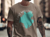 Brown t-shirt with Lake Moultrie, South Carolina map graphic and compass elements.