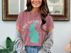 Rose t-shirt with white Lake Monticello, SC map and compass graphic.