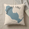 Sandhill Lake Wisconsin map on a cream textured pillow with a gray blanket.