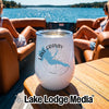 A white travel tumbler featuring a Lake Granby, Colorado map graphic sits on a wooden boat table.