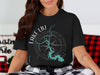 Black t-shirt with compass design featuring Lake LBJ, Texas outline.