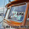 Sticker of Granbury Life with lake graphic on boat window and Lake Lodge Media logo.