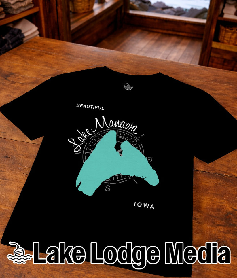 Black t-shirt with teal "Beautiful Lake Menawa" graphic and "Lake Lodge Media" logo.