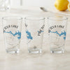 Three clear glasses feature a blue map outline of Pectola Lake and a compass rose.
