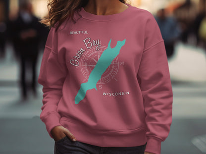 Pink sweatshirt with "Green Bay Wisconsin" and compass graphic.