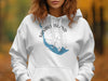 White hoodie with Sanibel Island, Florida map and compass graphic.