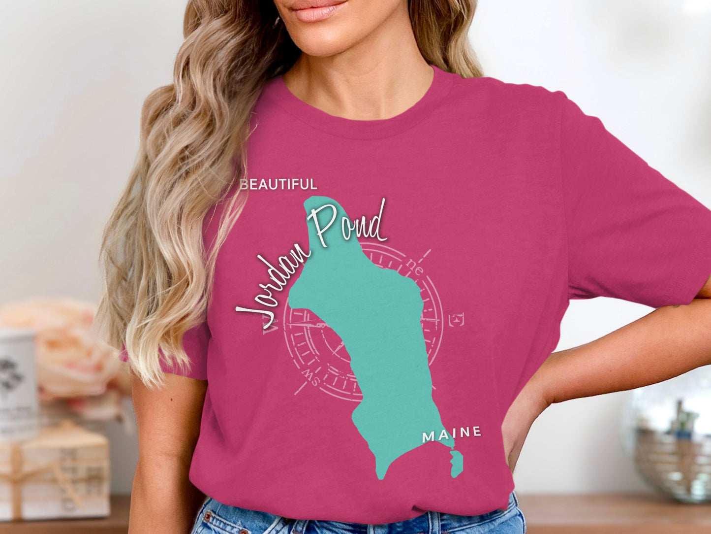 Pink t-shirt with a turquoise map of Maine and "Jordan Pond" text.