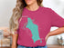Pink t-shirt with a turquoise map of Maine and "Jordan Pond" text.